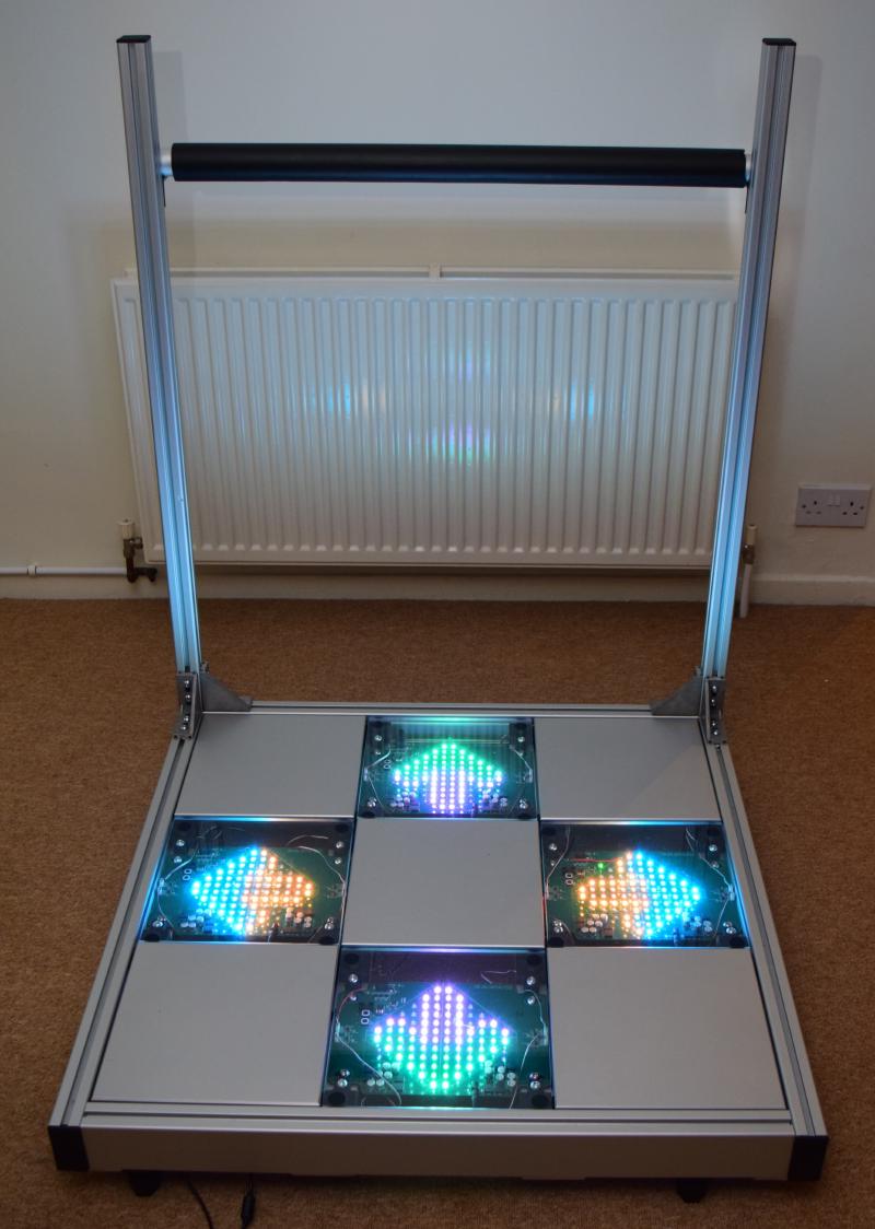 Photo of a RE:Flex Dance Pad with LEDs showing arrows